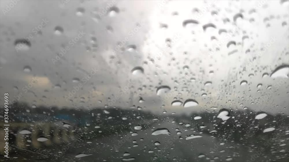 Slow Motion Of Rain Drop Water On Glass Of A Moving Car On A Highway FHD 1080P Slow Motion Of Rain Drop Water On Glass Of A Moving Car On A Highway FHD 1080P