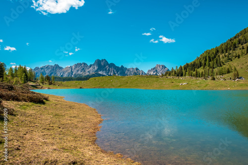 Calm lake in a sunny day in the beautiful Carnic Alps, Friuli-Venezia Giulia, Italy