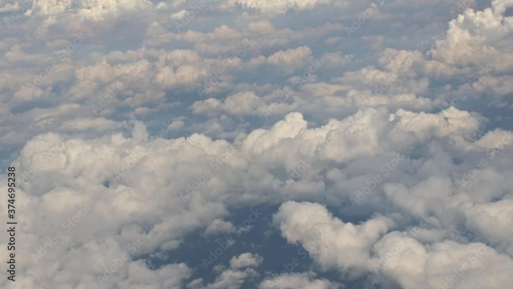 Cloud top aerial view of blue sky beautiful natural landscape from airplane window. Cloud top aerial view of blue sky beautiful natural landscape from airplane window.