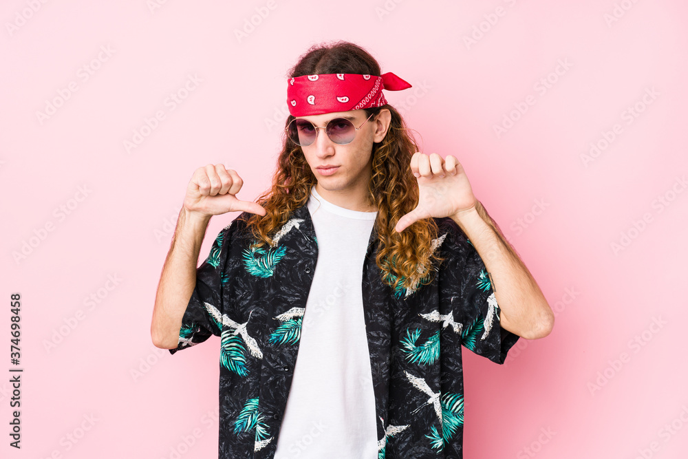 Young hippie caucasian man isolated feels proud and self confident, example to follow. Young hippie caucasian man isolated feels proud and self confident, example to follow.