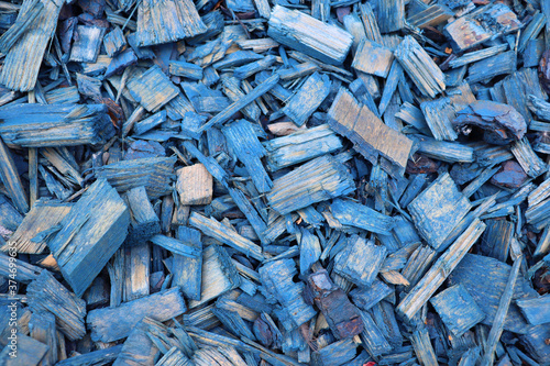  image of blue wood shavings as decor and background close-up