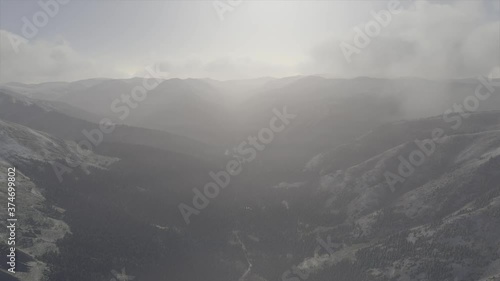 A foggy valley in the mountains photo