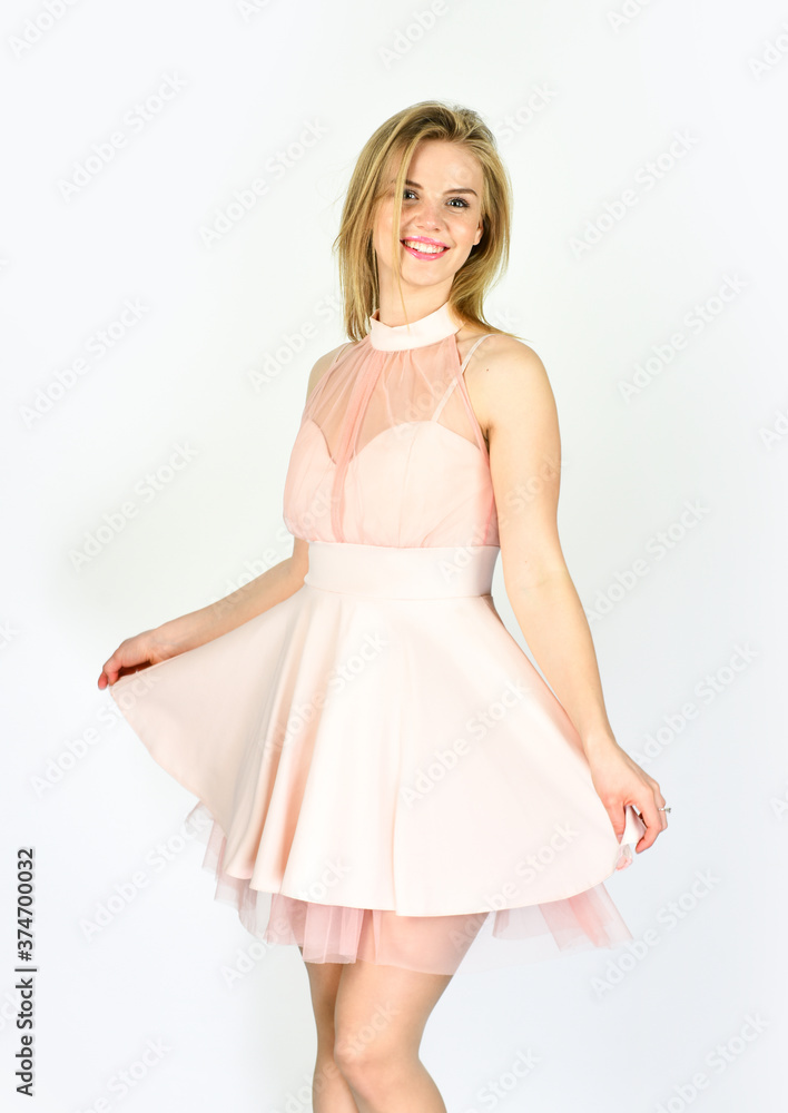Clothing store. looking trendy and stylish. fashionable look of sexy woman. having perfect hairstyle. female beauty and fashion. beauty smile. sexy blond wear pink dress. ready for formal party Clothing store. looking trendy and stylish. fashionable look of sexy woman. having perfect hairstyle. female beauty and fashion. beauty smile. sexy blond wear pink dress. ready for formal party