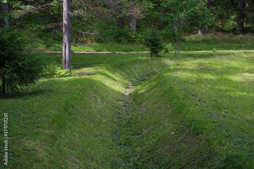Photos drainage ditch aeration with lawn green altorki.