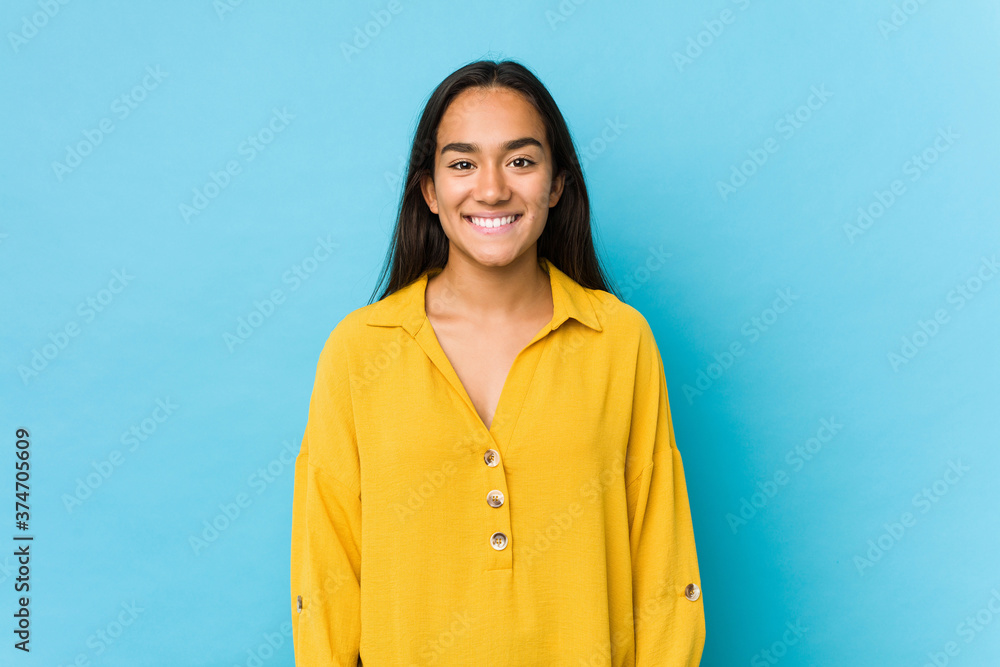 Young indian woman smiling isolated Young indian woman smiling isolated