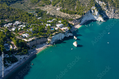aerial drone view baia delle zagare hotel beach gargano puglia italy photo