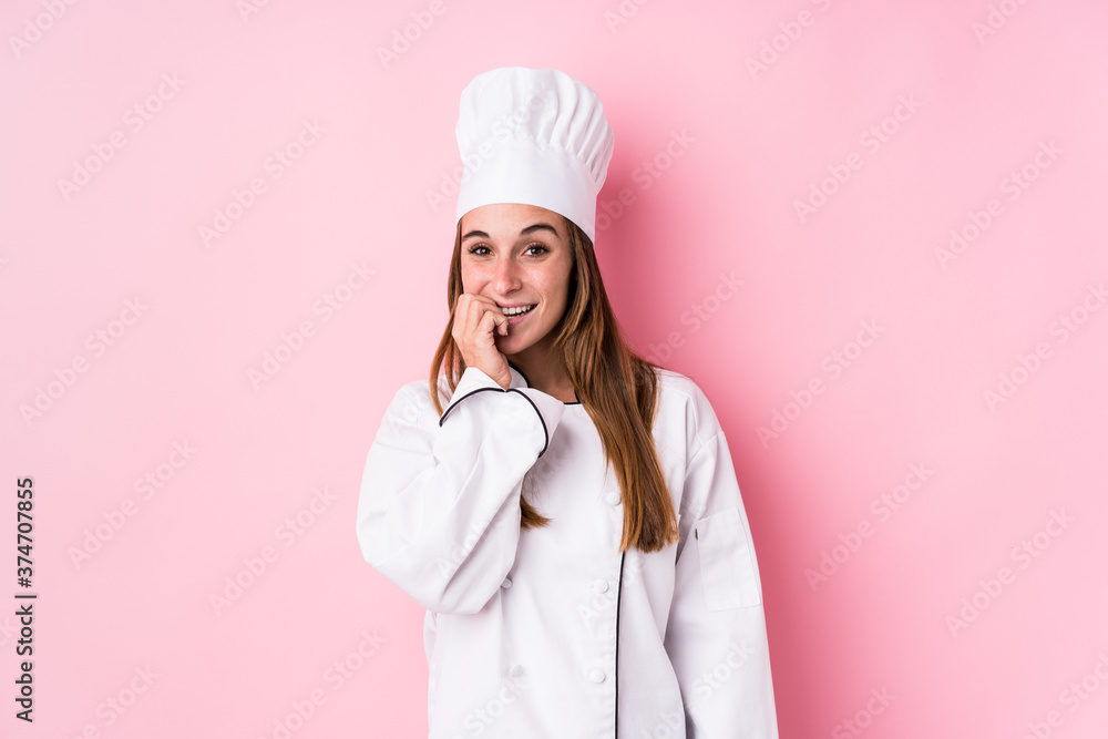 Young caucasian chef woman isolated biting fingernails, nervous and very anxious. Young caucasian chef woman isolated biting fingernails, nervous and very anxious.