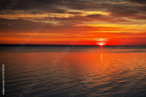 Beautiful summer landscape. Scenic fiery sunset. Composition of nature