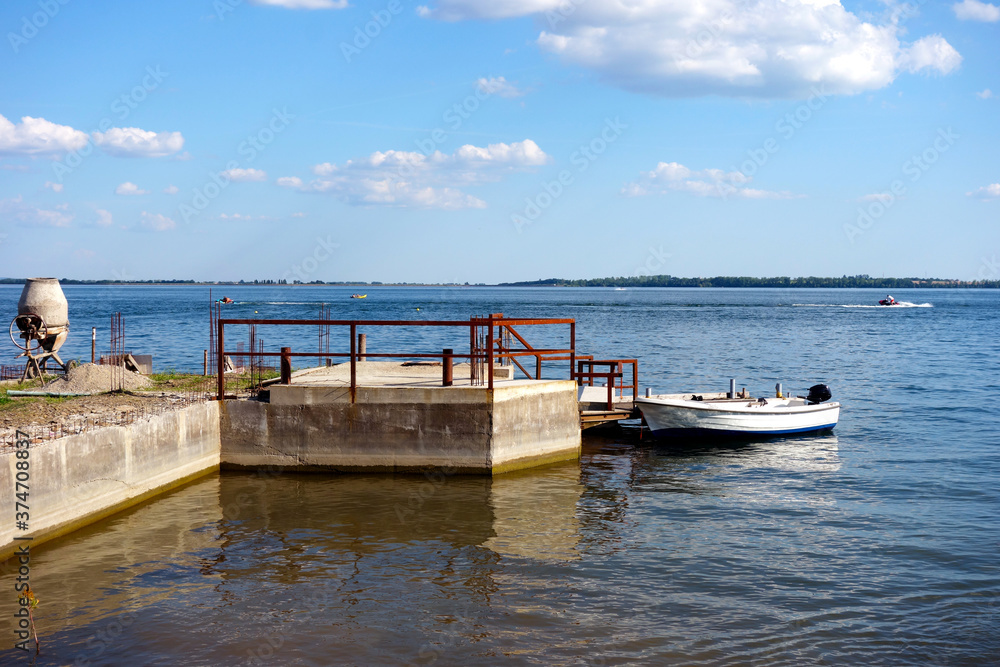 Construction of a lake pier under construction