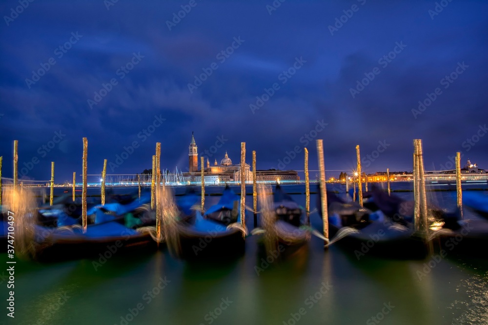 Gondolas moored by Saint Mark square, Venice, Italy, Europe.