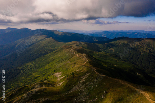 view of the Montenegrin ridge from Mount Pip Ivan, landscapes of the Carpathian Mountains, Mount PICH. © Niko_Dali