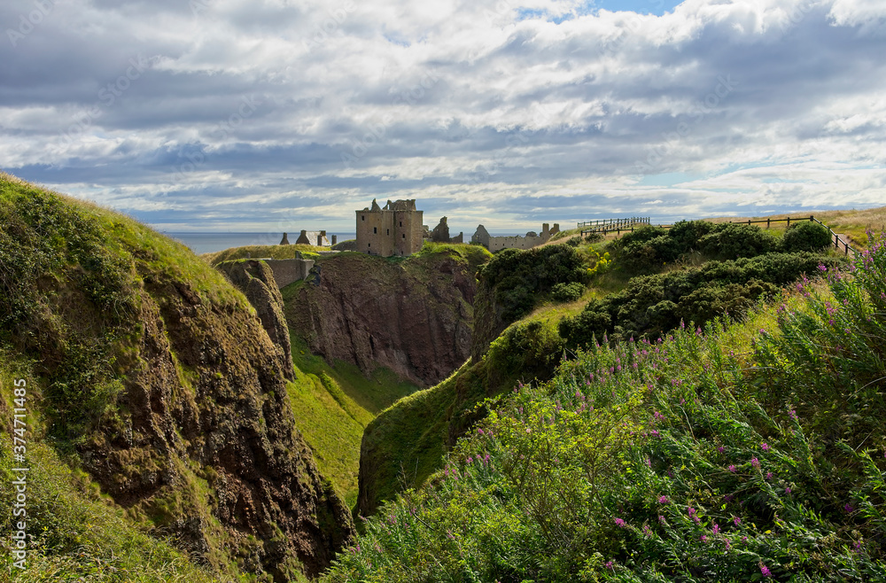 Dunnottar Castle a ruined 15th century medieval fortress built upon a rocky headland near Stonehaven in the North East of Scotland