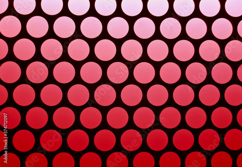 Geometric pattern of the elevator ceiling in red and black color 