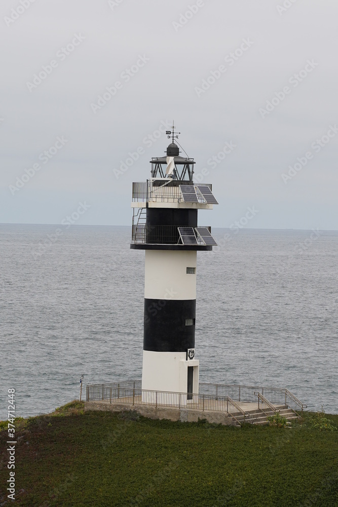 Lighthouse of Pancha Island. Beautiful  coastal landscape in  Ribadeo,Lugo. Galicia,Spain