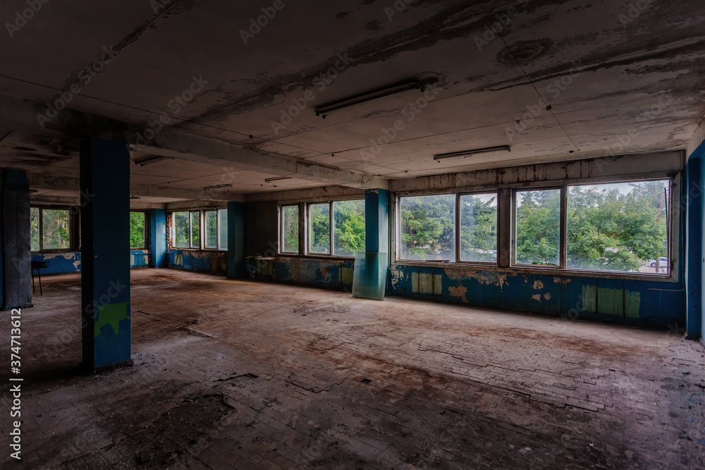 Dark abandoned industrial or office building interior Dark abandoned industrial or office building interior