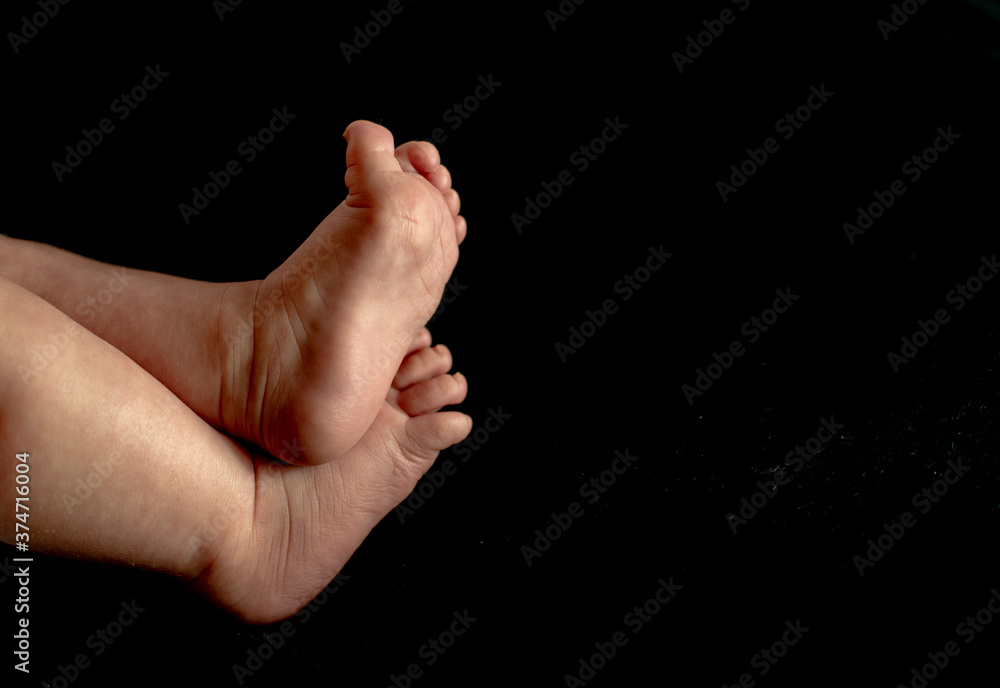 Baby feet in low key Baby feet in low key