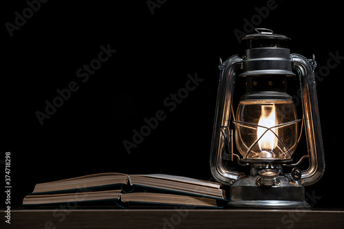 image of book lamp dark background 