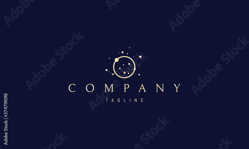 Vector golden logo on which an abstract image of the constellation Ursa Major in a circle. photo