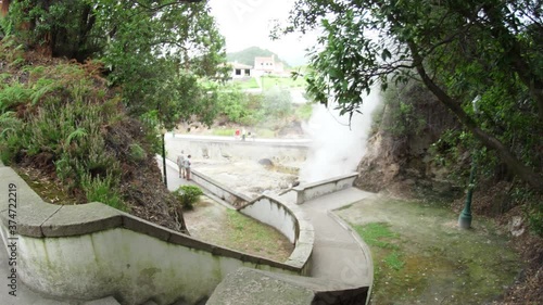 thermal pool from volcanic lake steaming in furnas Azores Portugal slow motion photo