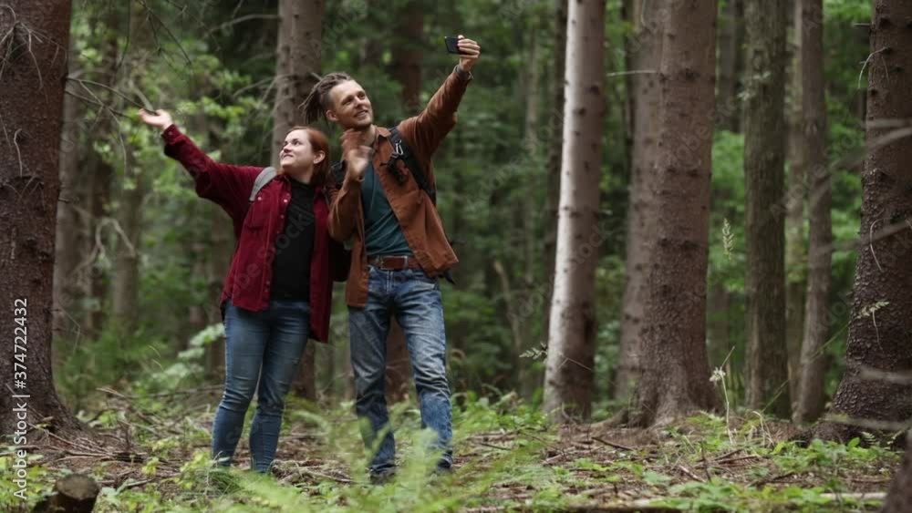 couple makes a video call from the woods couple makes a video call from the woods