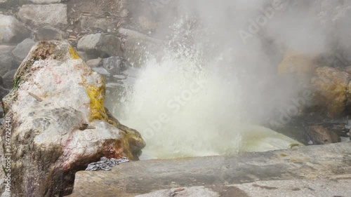 thermal pool from volcanic lake steaming in furnas Azores Portugal slow motion photo