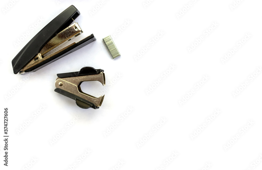 Isolated items for study and work in the office and at home stapler staples office top view on a white background space for text Isolated items for study and work in the office and at home stapler staples office top view on a white background space for text