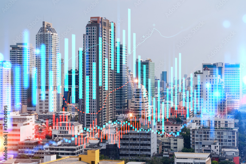 Forex and stock market chart hologram over panorama city view of Bangkok, the financial center in Asia. The concept of international trading. Double exposure.