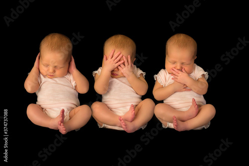 Photography One baby photographed three times doing hear see speak no evil