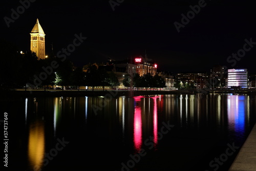 Night view of central Norrk  ping. Hedvig kyrka and Grand hotel.