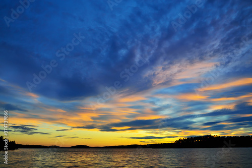 Beautiful fiery sunset. Lake Keret, Northern Karelia, Russia photo