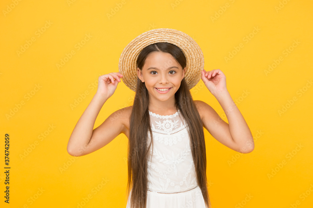 Adorable little girl wearing elegant hat. Have funny summer holiday. Summer tour. Leisure and entertainment concept. Summer happiness. Vacation mood. Tropical tour. Sale and discount. Goods for kids Adorable little girl wearing elegant hat. Have funny summer holiday. Summer tour. Leisure and entertainment concept. Summer happiness. Vacation mood. Tropical tour. Sale and discount. Goods for kids