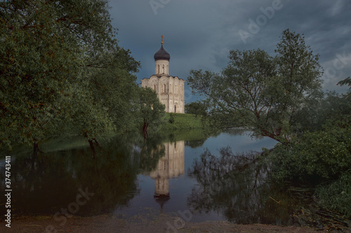 Church of Intercession on the Nerlin the rainy spring  evening. Russia. View from the lake  © Julia Shepeleva