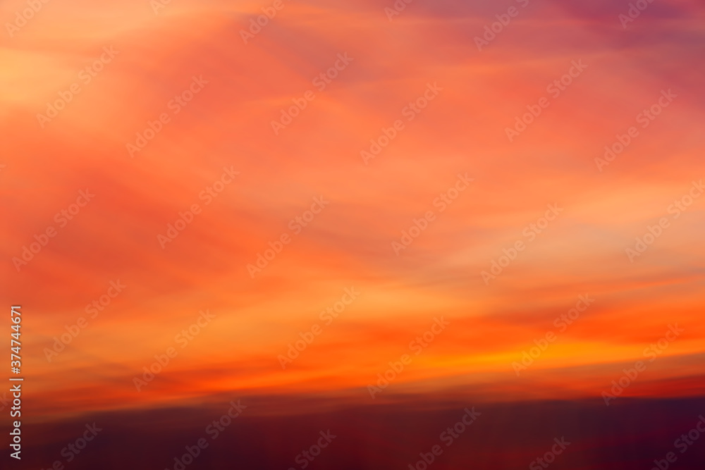 Abstract and colorful blurry background of dramatic bright sky