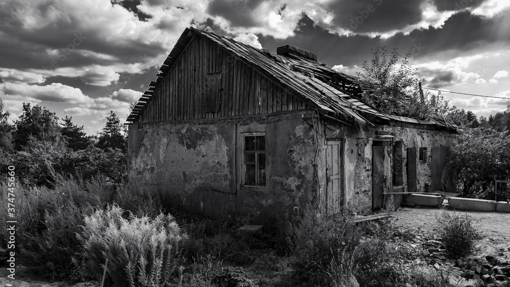 Old building with a collapsed roof in the village of Losevo Old building with a collapsed roof in the village of Losevo