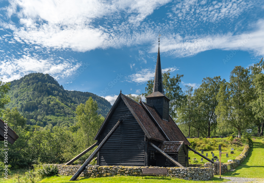 The stunning Rodven Stave Church (stavkyrkje), More og Romsdal county, Norway. The brown, wooden church was built in a long church style during the 12th century by an unknown architect.