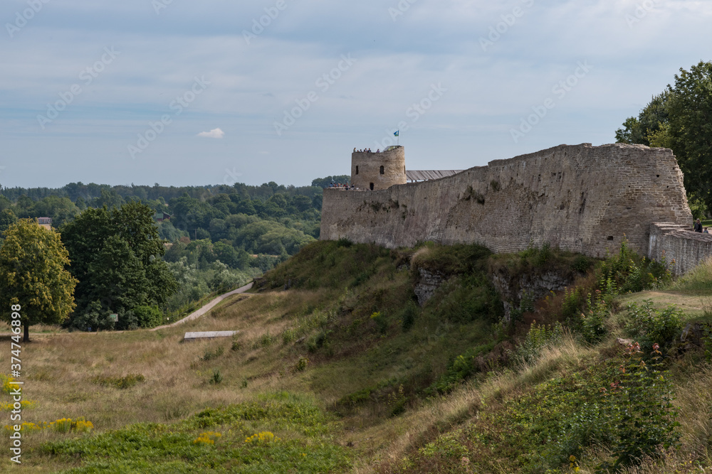 Medieval Izborsk fortress wall and Lukovka tower.  Izborsk, Pskov Region, Russia.