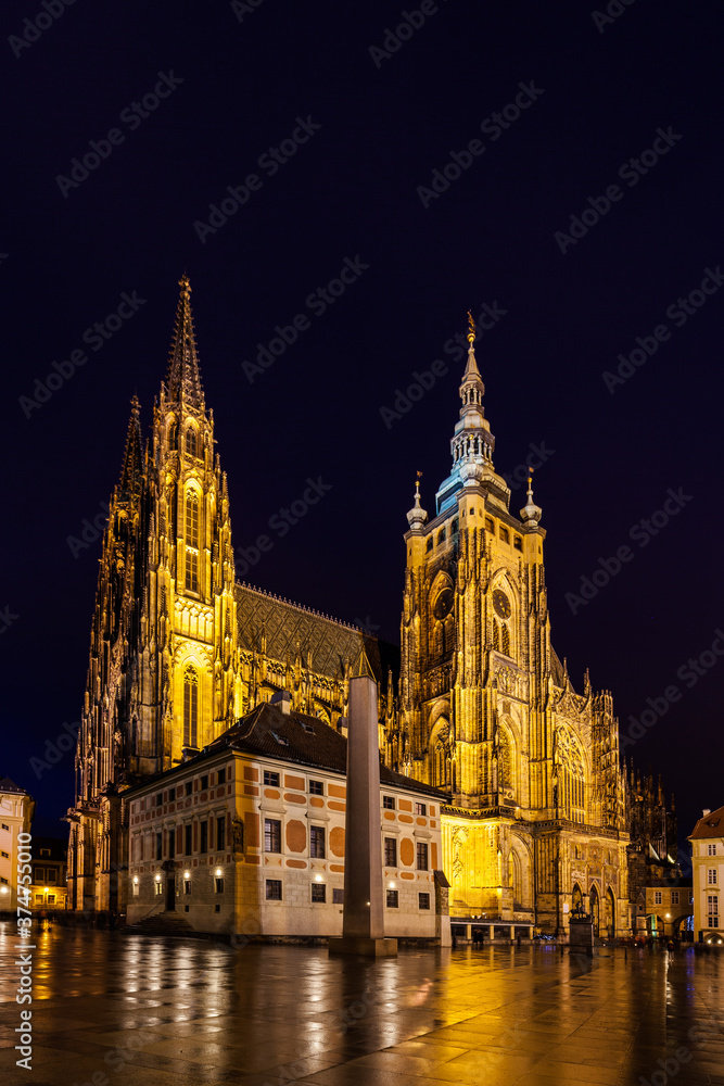 Night view of  the Metropolitan Cathedral of Saints Vitus (St. Vitus Cathedral) with light illumination located in Prague Castle, Czech Republic