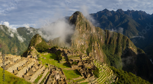 Panorama landscape of amazing sunrise in moutains and historical ancient inca civilization of Machu Picchu mountain in Aguas calientes, cusco, peru © José Rego