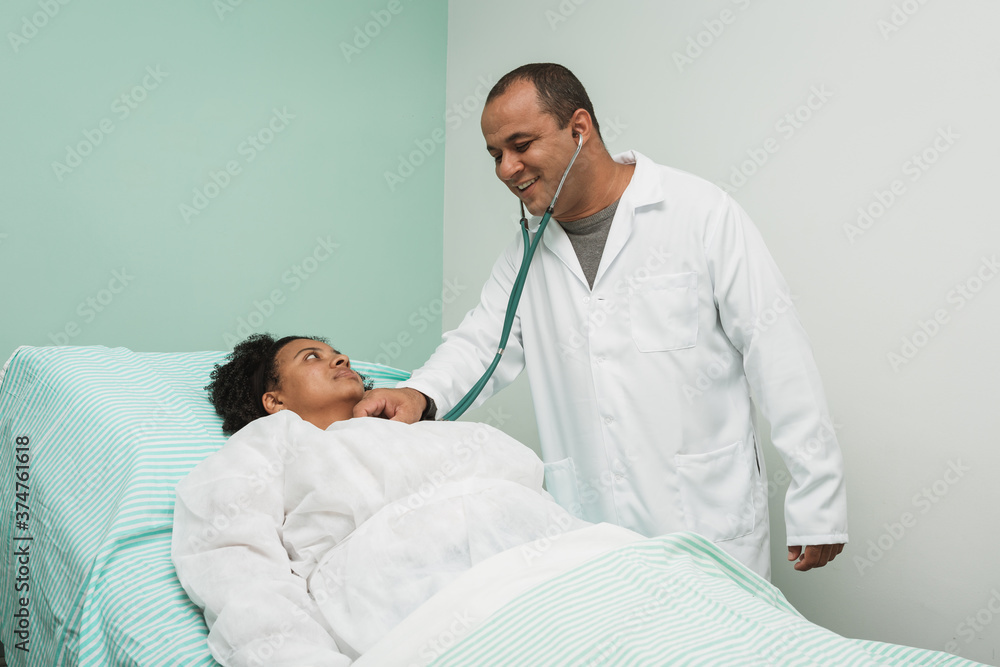 doctor auscultating heart doctor auscultating heart