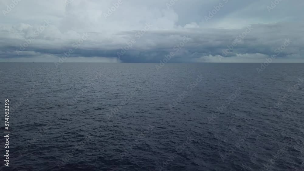 Stormy clouds over dark ocean ready for raining
Stormy clouds over dark ocean ready for raining