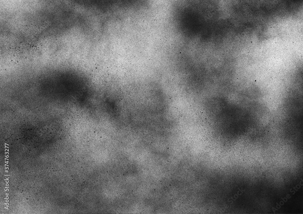 Dark subtle grit texture. Gritty grunge background with black paint splatter on paper Dark subtle grit texture. Gritty grunge background with black paint splatter on paper