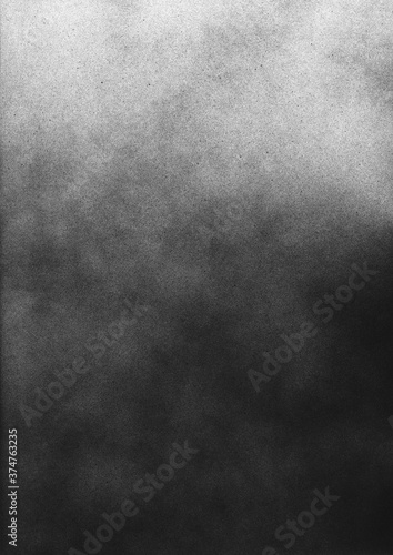 Vintage black and white noise texture. Abstract splattered gradient background for vignette.