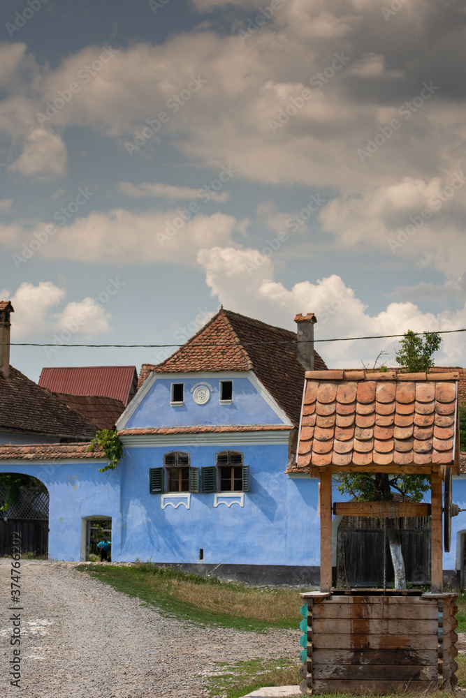 houses painted in blue in Roadeș, Brașov, Romania 2019