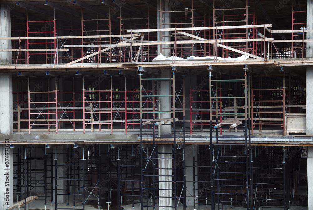 building under construction iron metal beams structure background building under construction iron metal beams structure background