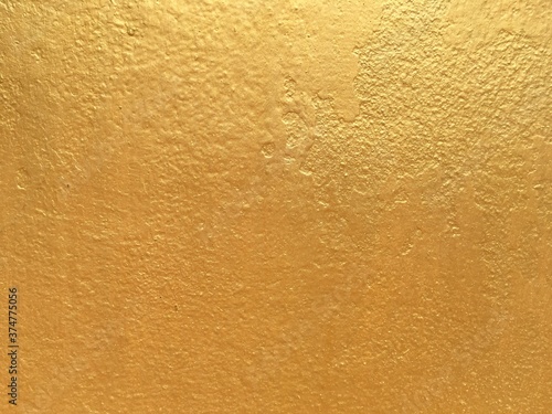 Gold color cement wall texture 