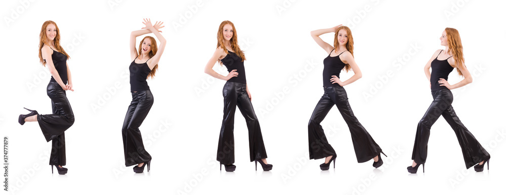 Redhead woman in black bell bottom pants on white Redhead woman in black bell bottom pants on white