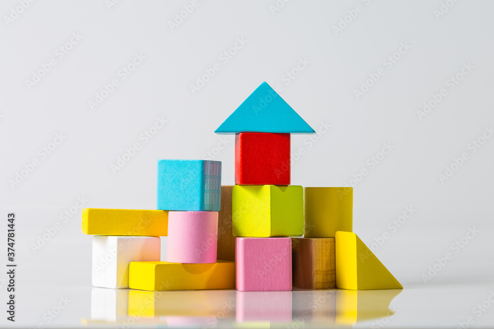 Fototapeta premium Model of the wooden house (real estate) on white background