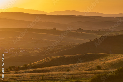 rolling hills in autumn sunset nature background