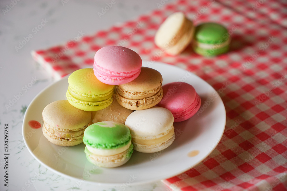 Macarons on plate in Marble table Macarons on plate in Marble table