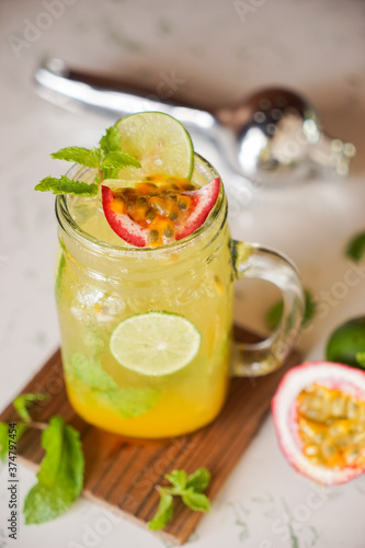 One glass of passion fruit on marble table